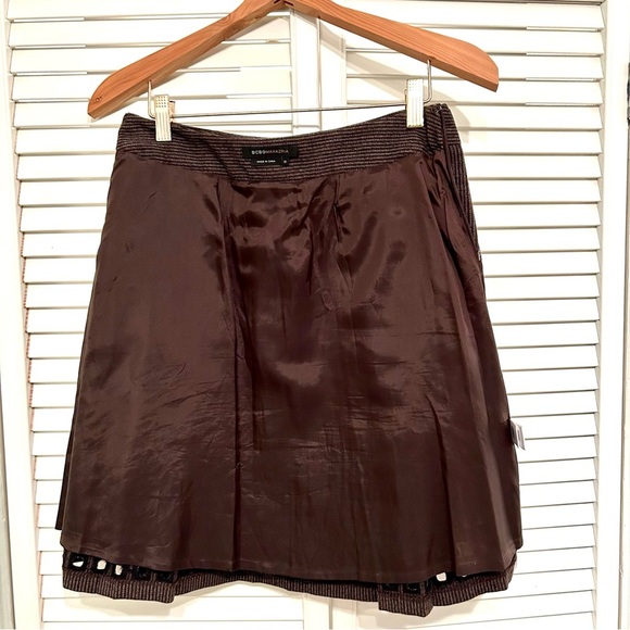 BCBGMAXAZRIA Wool blend skirt with embroidered square cutouts at hem box pleats - Picture 6 of 11